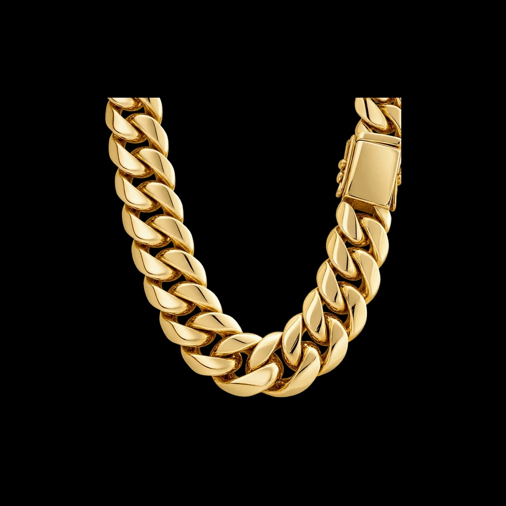 A heavy polished gold Cuban link chain with a rectangular box clasp
