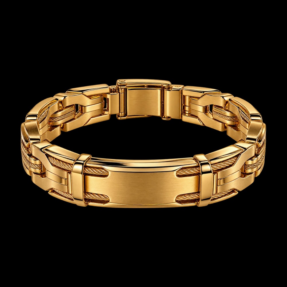 A gold bracelet of brushed links around a plain polished identity plate